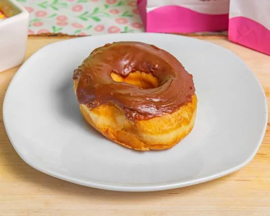 A chocolate iced raised donut