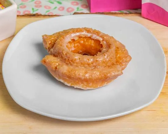 A glazed old-fashioned cake donut